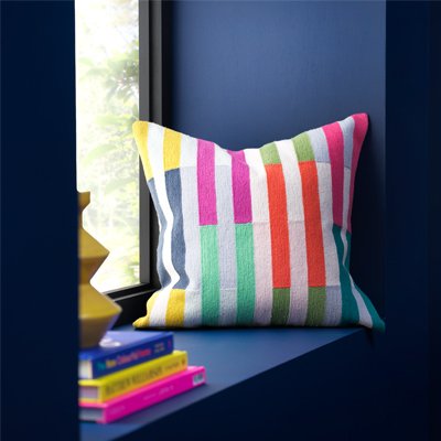 Colourful striped cushion.