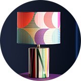 Habitat x Margo Selby collaboration banner with a colourful lamp with geometric print.