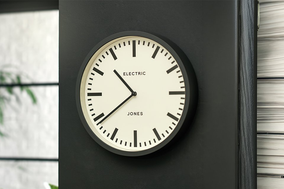 Jones Electric Wall Clock in grey colour.