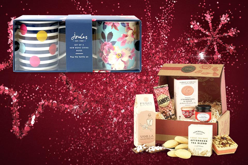 An afternoon tea hamper and a set of Joules mugs.