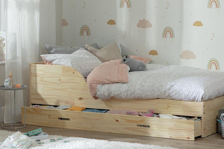 Image of a girls bed.
