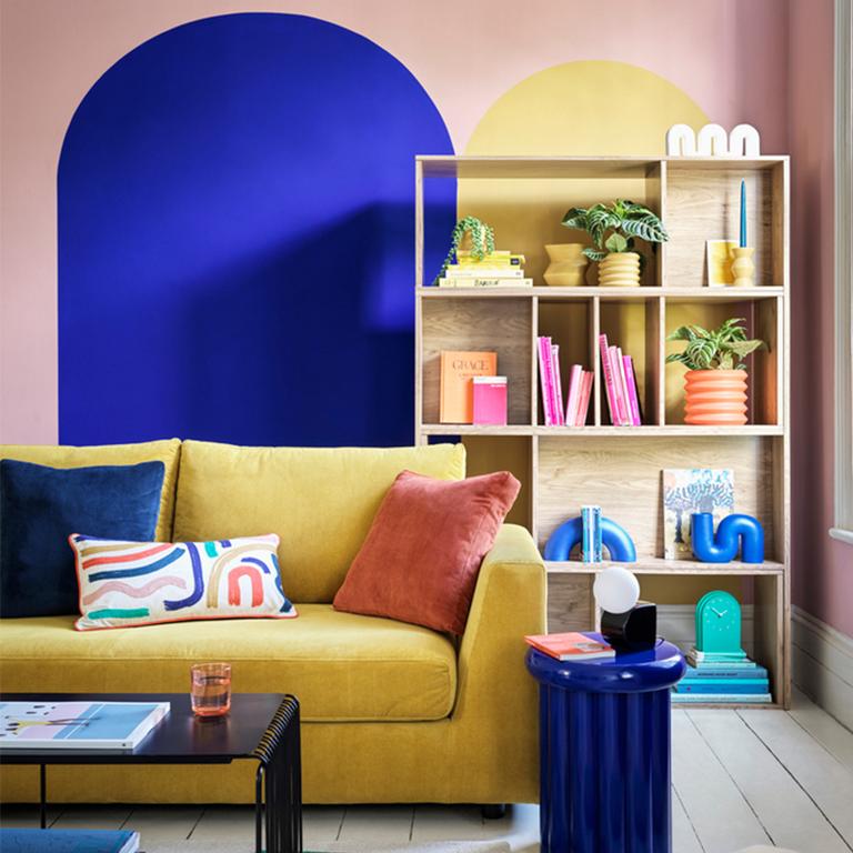 Image of living room decorated and furnished in bold, blocky colours.