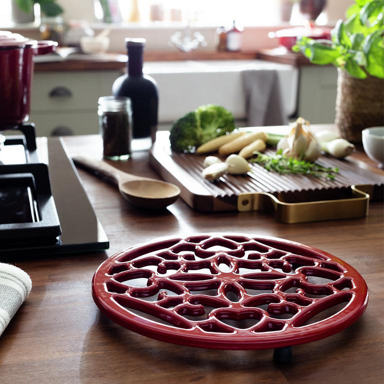 Image of kitchen countertop with a red hot plate.