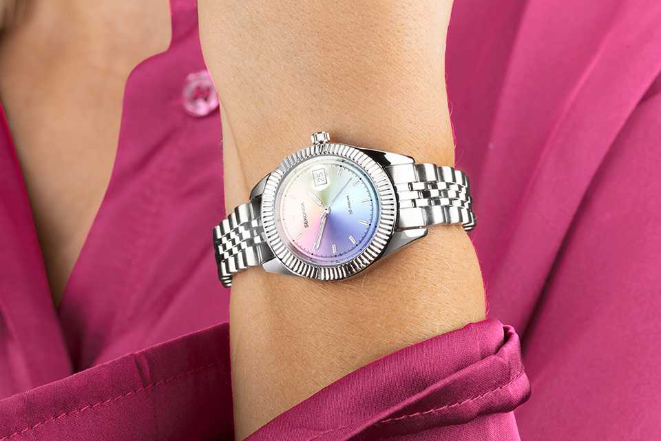 A woman wearing a Sekonda ladies stainless-steel silver bracelet watch.