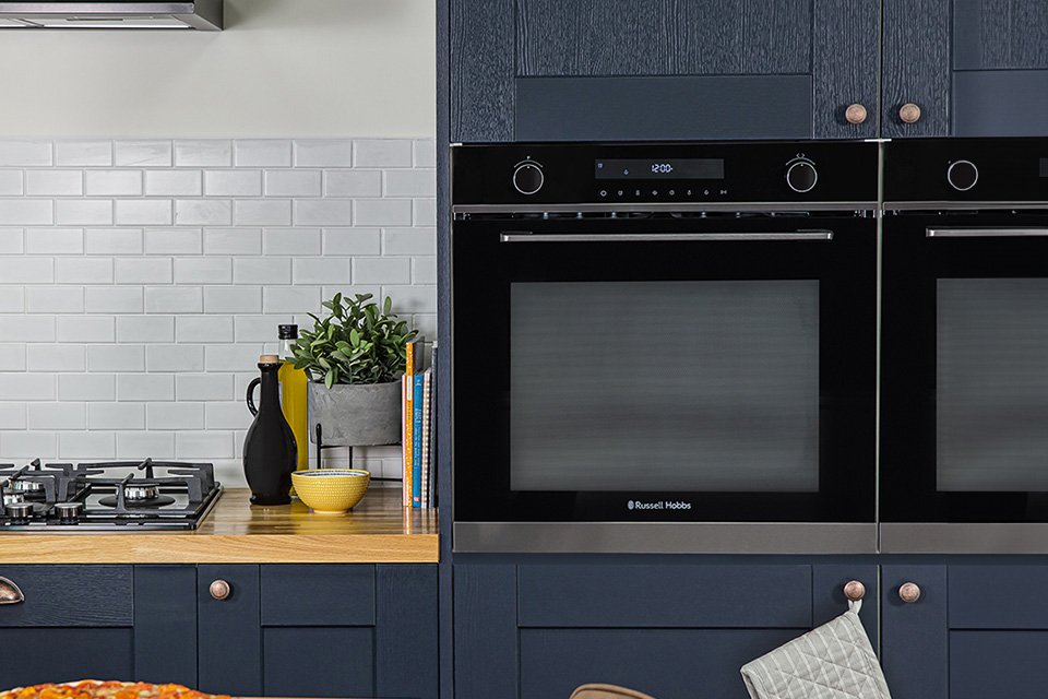 A Russell Hobbs built-in electric oven in a kitchen setup.