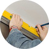 Measuring wall ready to put a curtain pole.