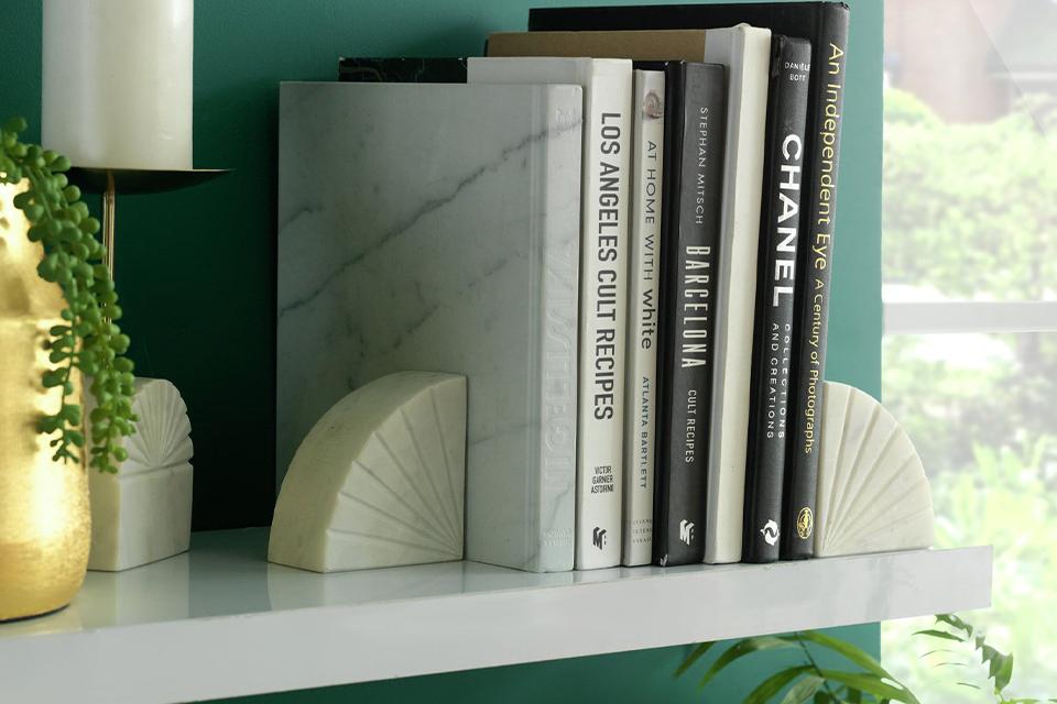 Image of books and a pair of bookends.