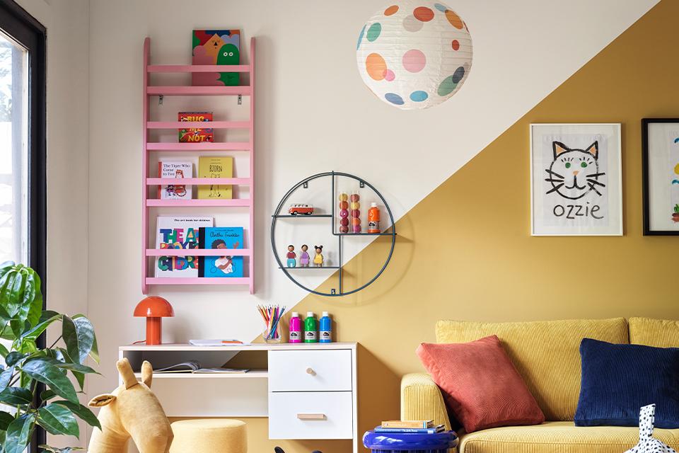 Brilliant bookcases.Argos Home Bodie white bookcase with Scandi-splayed legs in a kid's room.