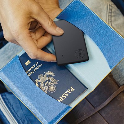 A bluetooth tracker in a passport holder.