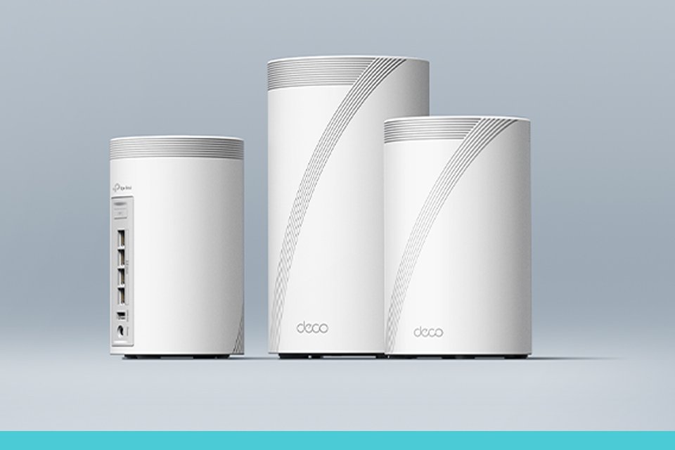 TP-Link Deco Mesh whole home Wi-Fi system against a grey background.