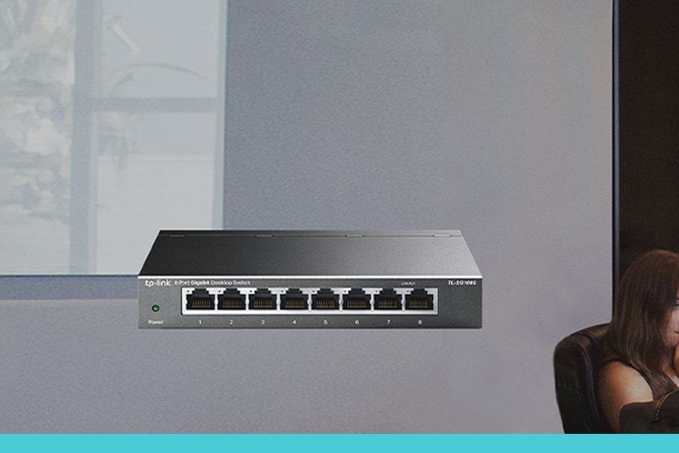 Rectangular TP-Link 5-port and 8 port SOHO network switch with Ethernet ports for wired connections.