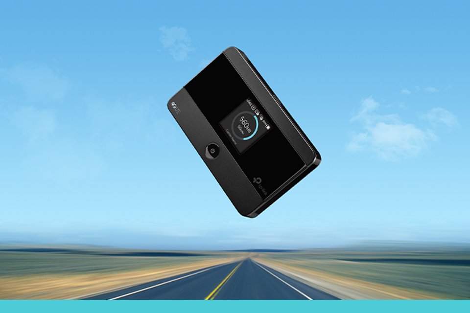 TP-Link 4G mobile travel router against an open road background.
