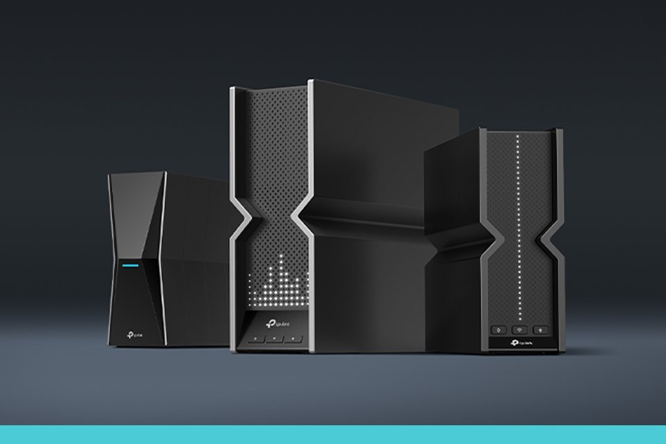 TP-Link dual-band wireless Wi-Fi routers against a black background.