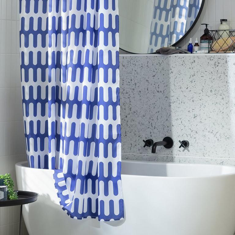 Blue patterned shower curtain.