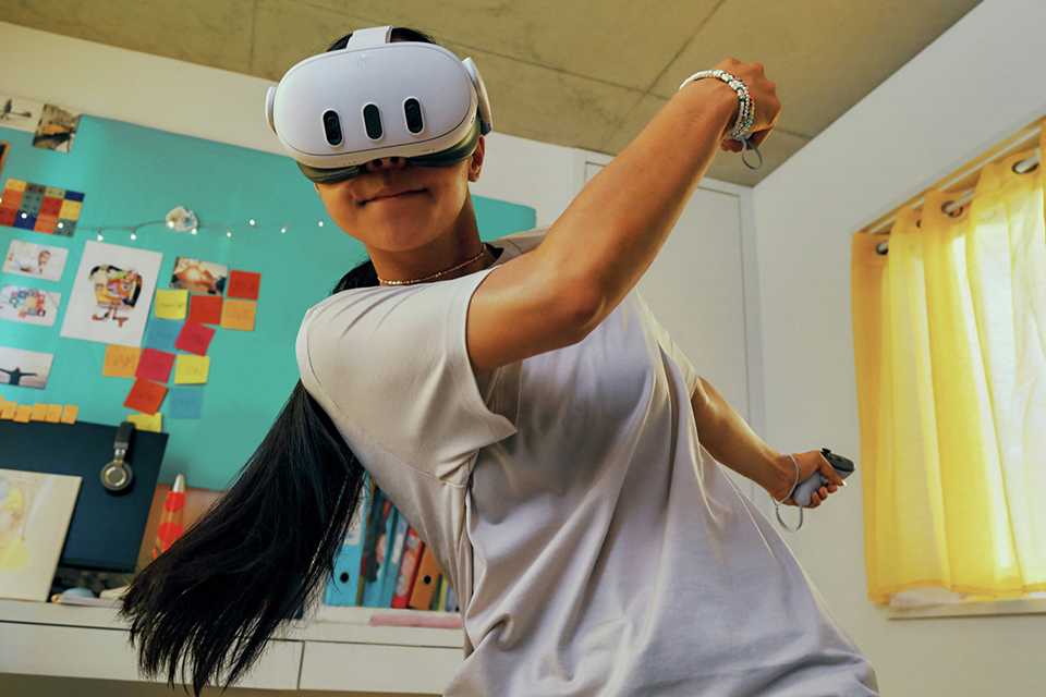 A girl playing on Meta Quest 3 All-In-One Mixed Reality Headset.
