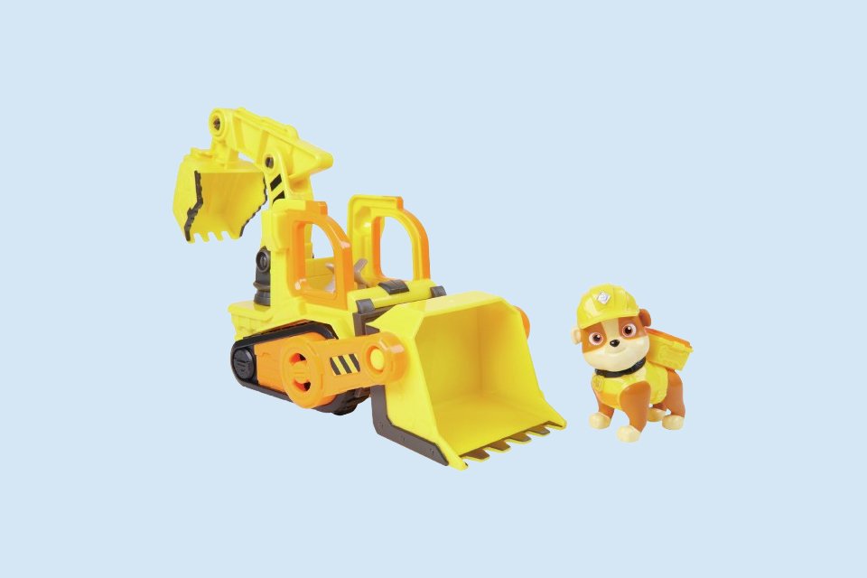 PAW Patrol character Rubble with his toy bulldozer.