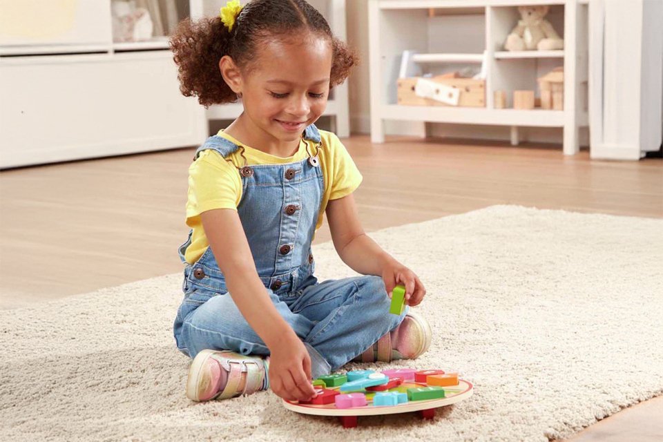 Melissa & Doug Shape Sorting Clock.