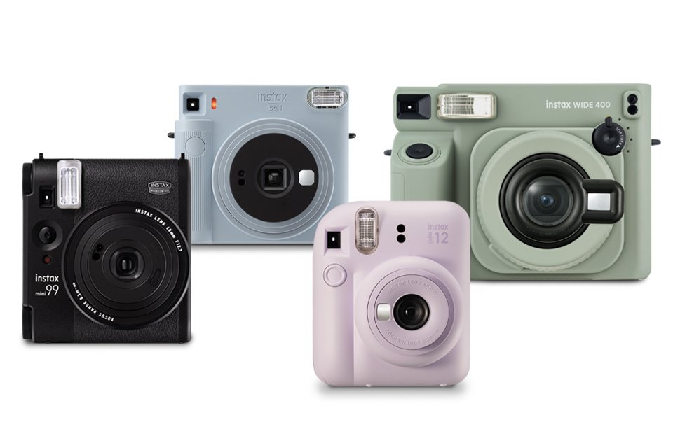 Variety of instax™ instant cameras in various colours.