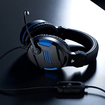 A girl playing video game on a console wearing headsets.