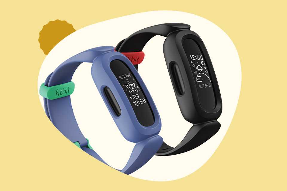 Two Fitbit kids' fitness trackers with blue and black straps.