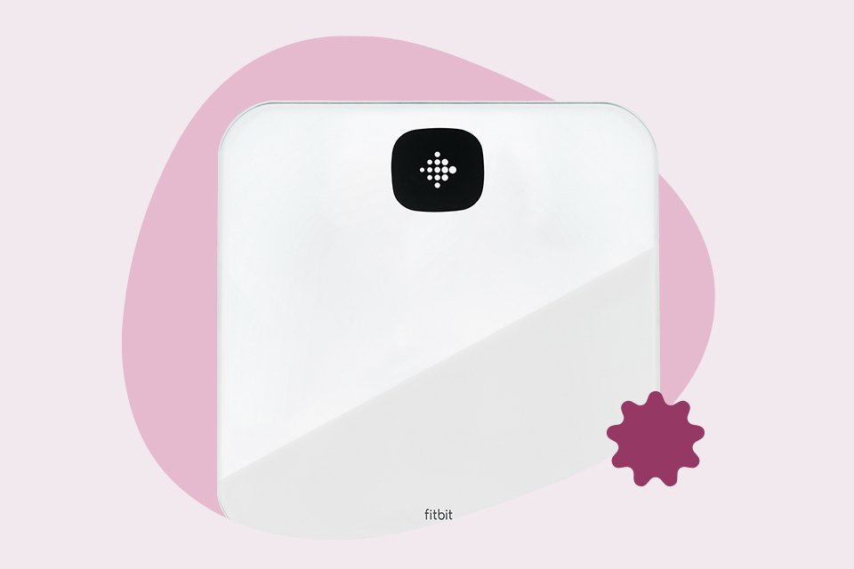 A white Fitbit Aria Air smart scale.