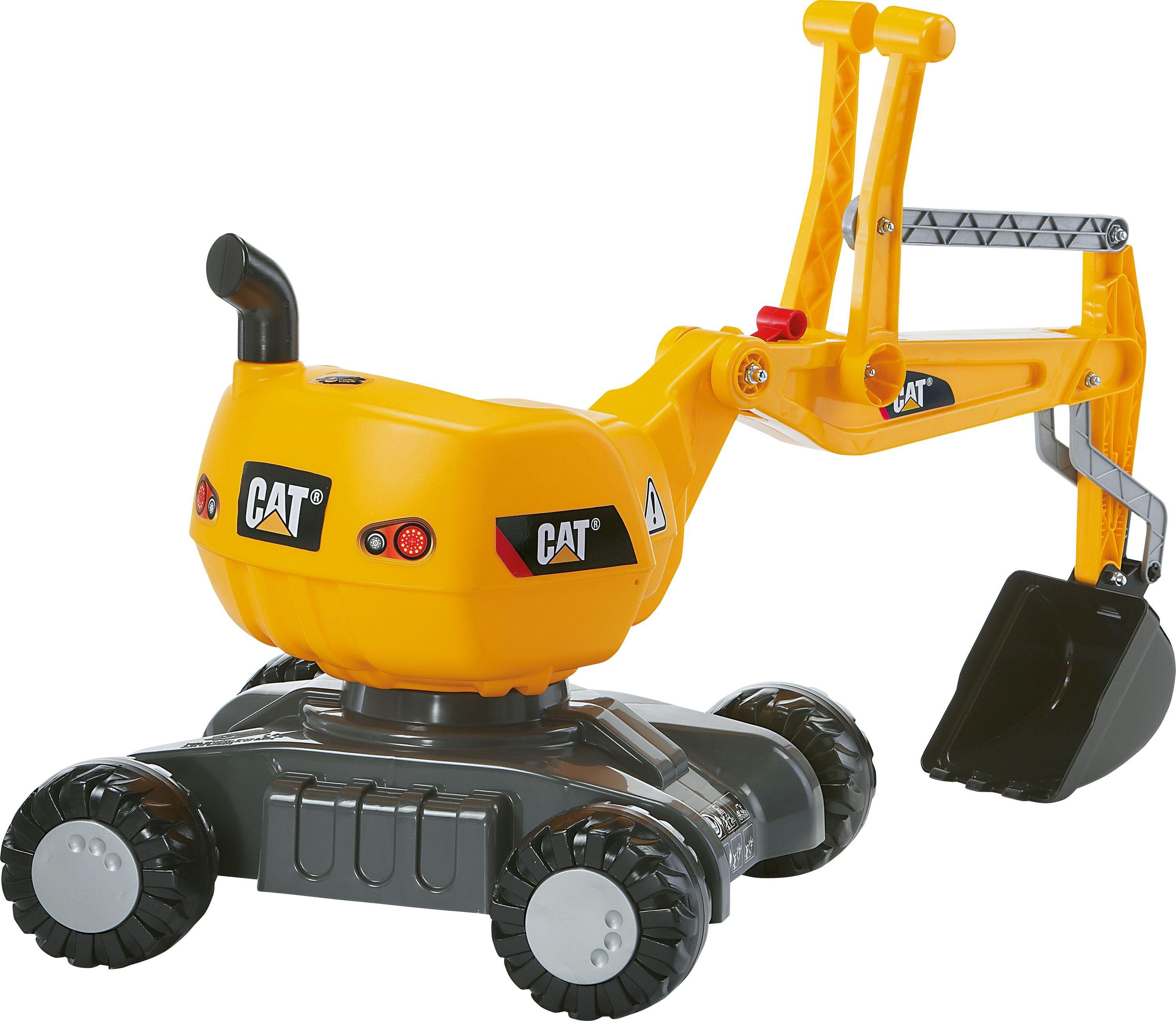 childs sit on digger toy