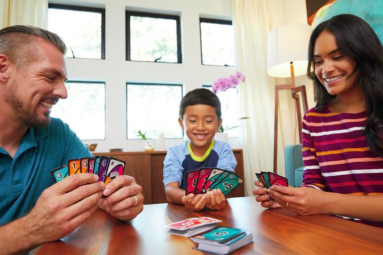 Family playing UNO together.