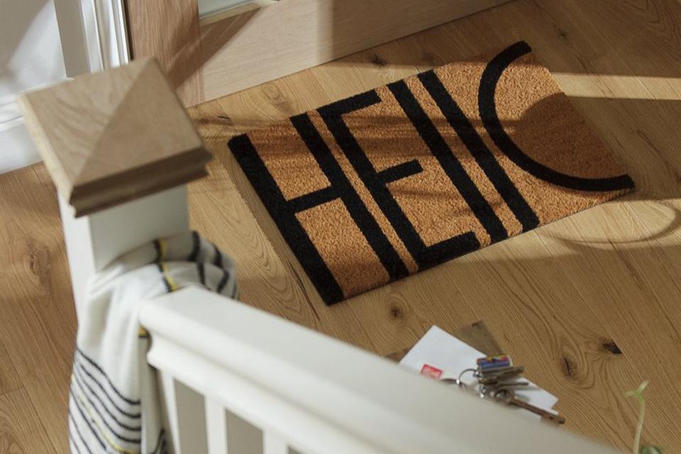 Coir doormat with Hello written on it.