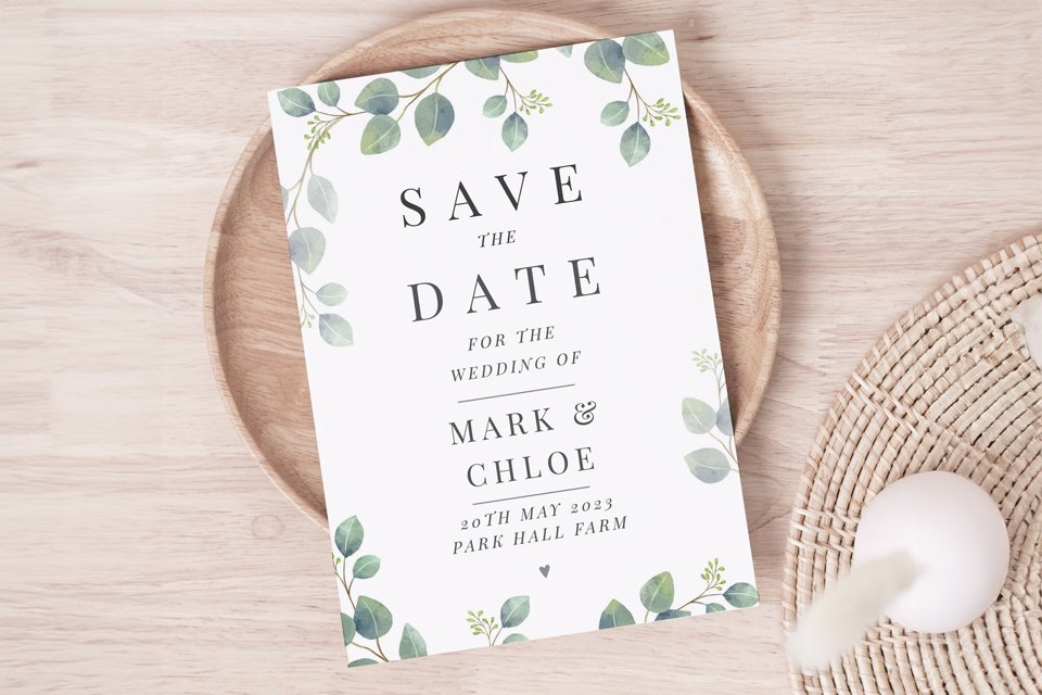 Ginger Ray Hen Party Confetti Balloon Arch set up over a pink sofa.