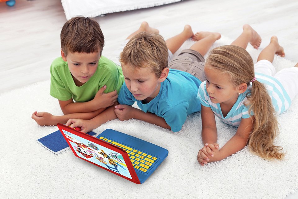 3 kids using the PAW Patrol Lexibook Laptop.