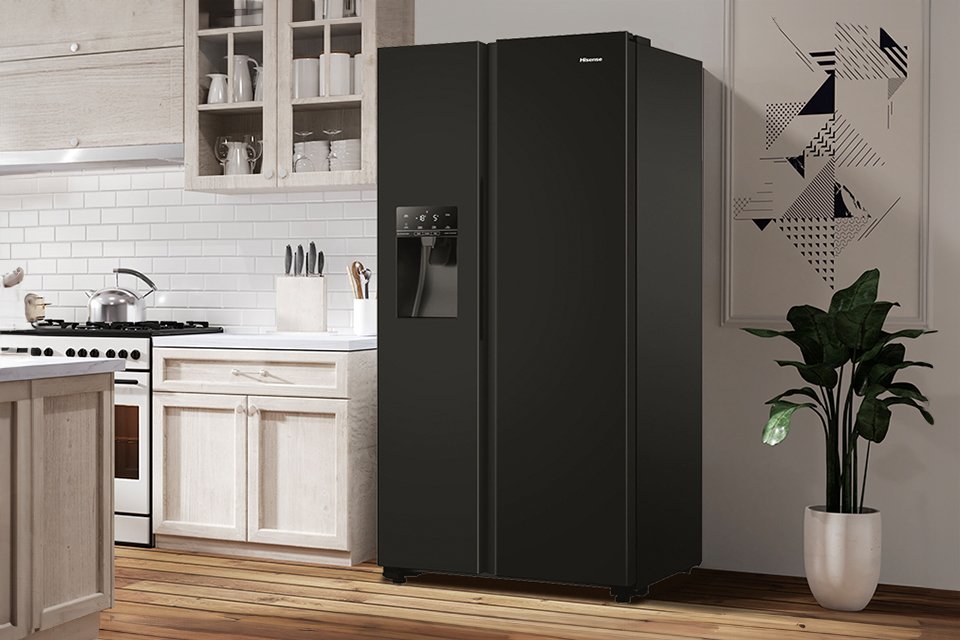 A Hisense American-style fridge freezer in a modern kitchen setup.