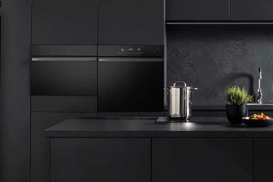 A black modular kitchen showcasing Hisense's cooking ranges.