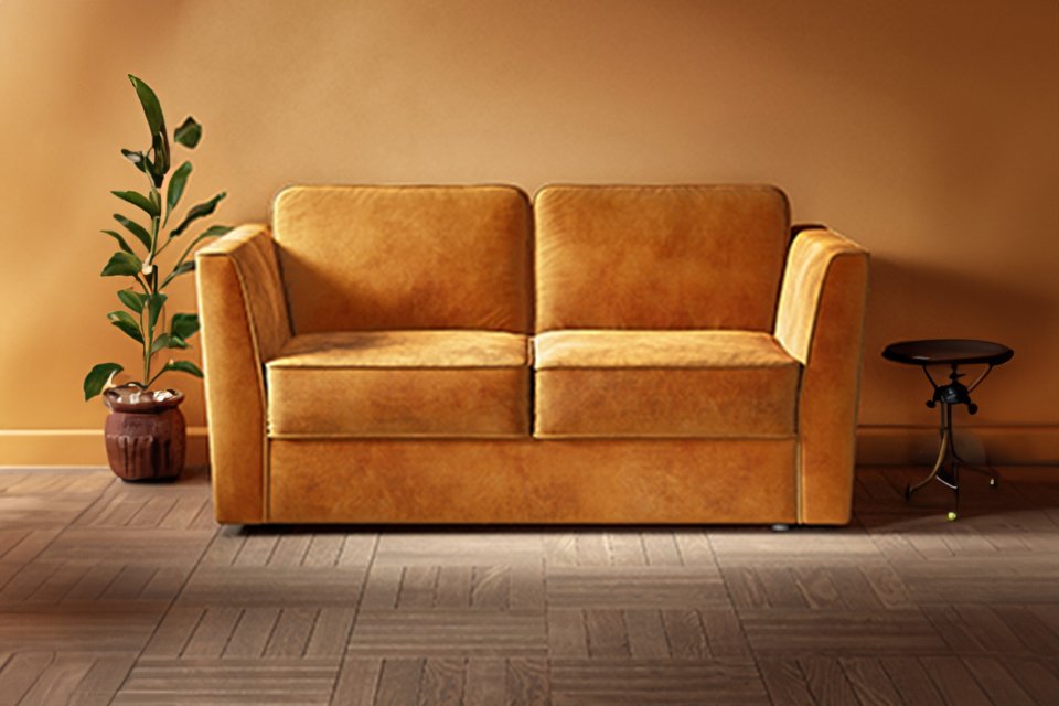 An orange Jay-Be® Elegance sofa bed in a living room setup. 
