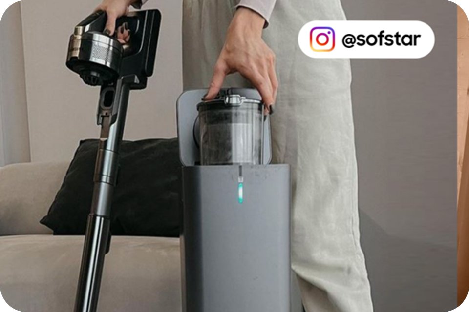 A shot of someone holding a vacuum cleaner with Instagram ID @sofstar written on the picture.