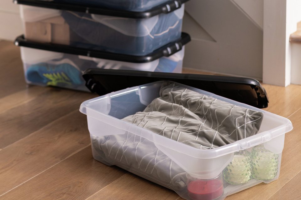 A split image of an Argos Home Set of 8 Drawer Organiser and Strata Curve 4 x 30L Plastic Storage Boxes with Lid.