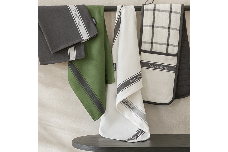 Kitchen textiles. Includes tea towels, aprons and oven gloves. Shop now.