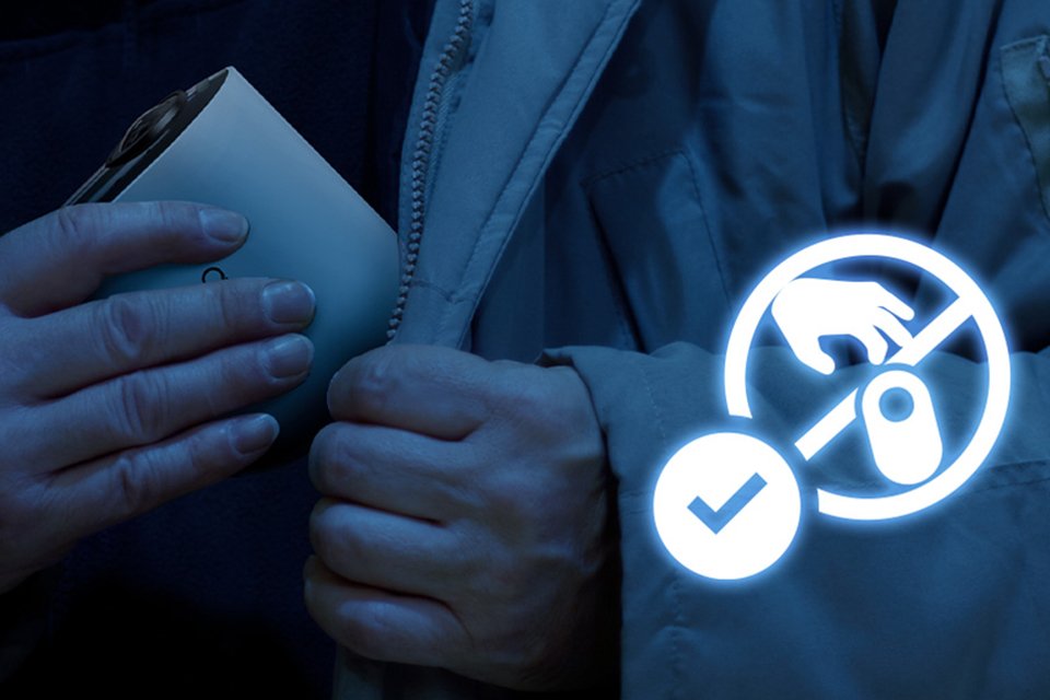 Someone shown stealing an Arlo security camera.