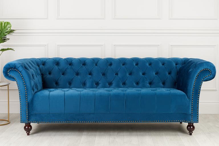 Blue velvet sofa.