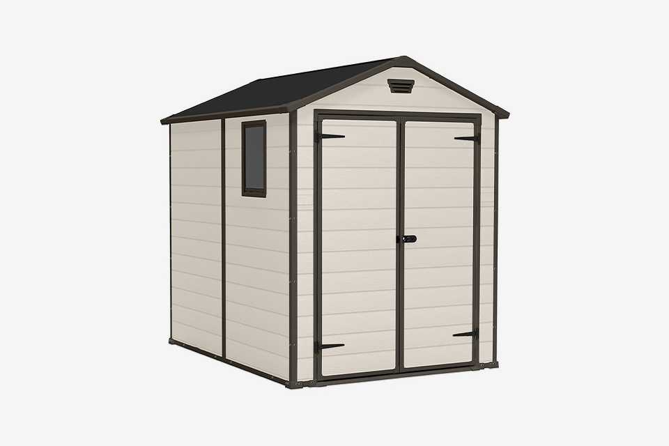 A pale white plastic shed.