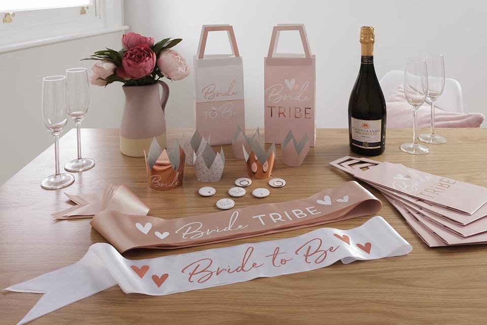 A hen party accessories kit, including sashes, crowns, badges and bags.