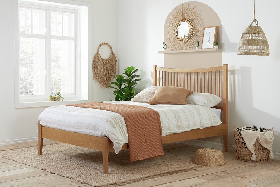 A Birlea Berwick kingsize oak bed frame.