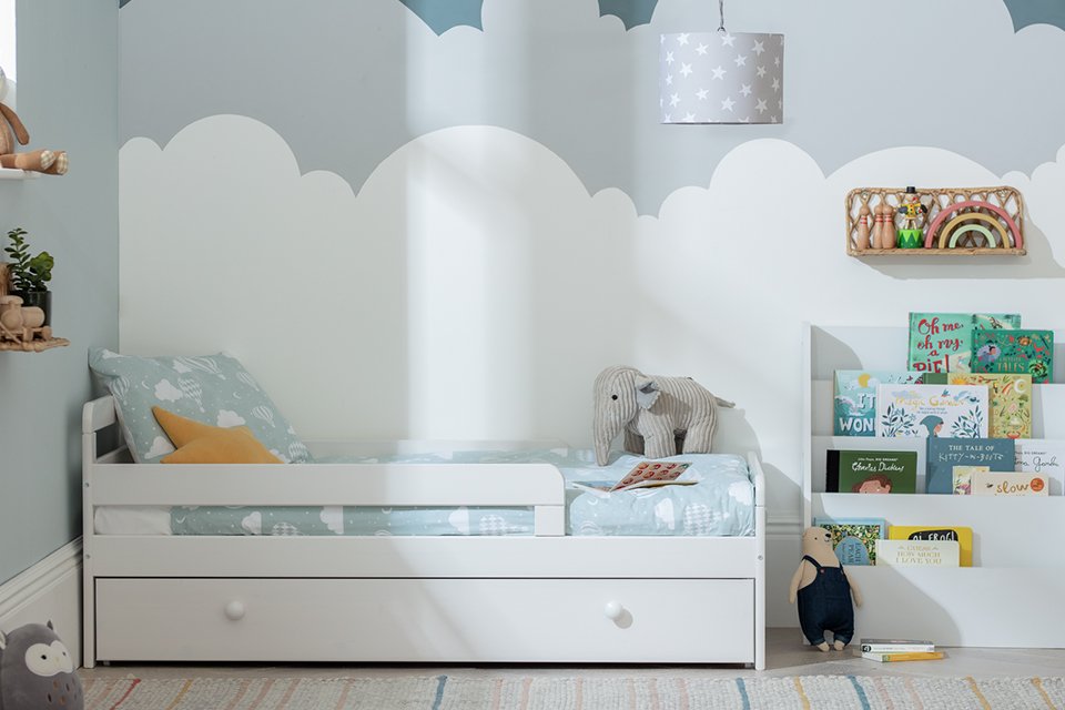 A Habitat Ellis toddler bed, drawer and kids mattress.