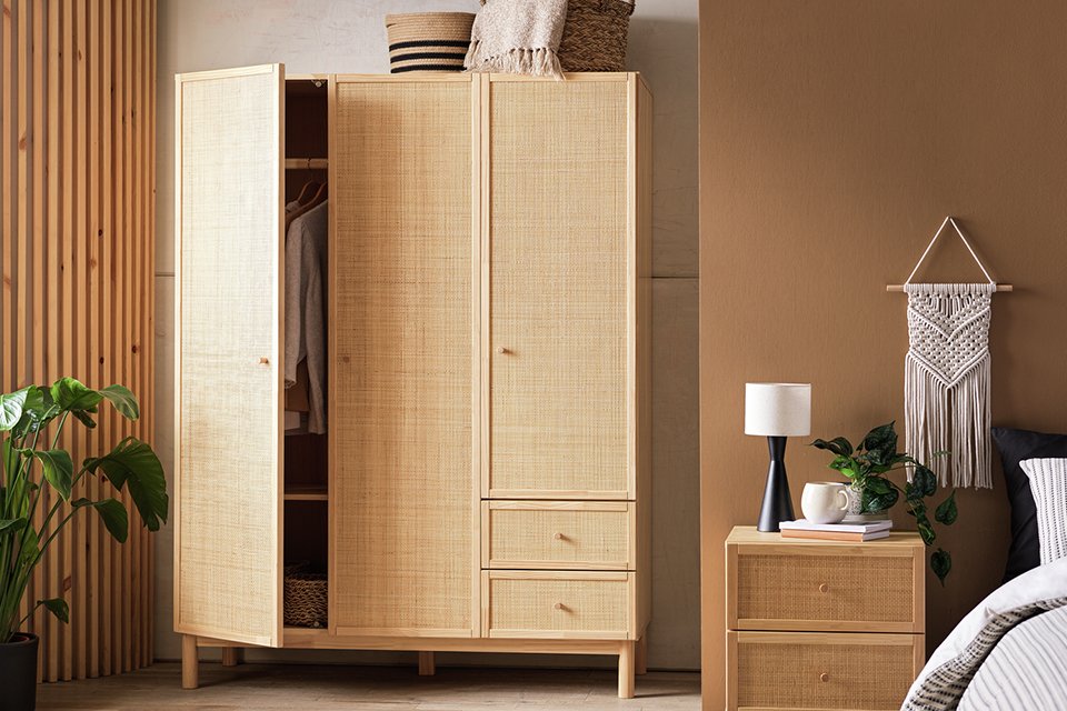wooden wardrobe in bedroom.