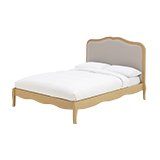 Wooden double bed frame with grey headboard.