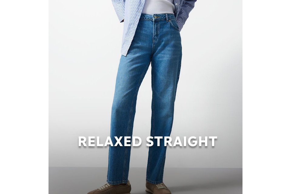 Model wearing mid‑rise relaxed straight‑leg jeans in 100% cotton denim. 