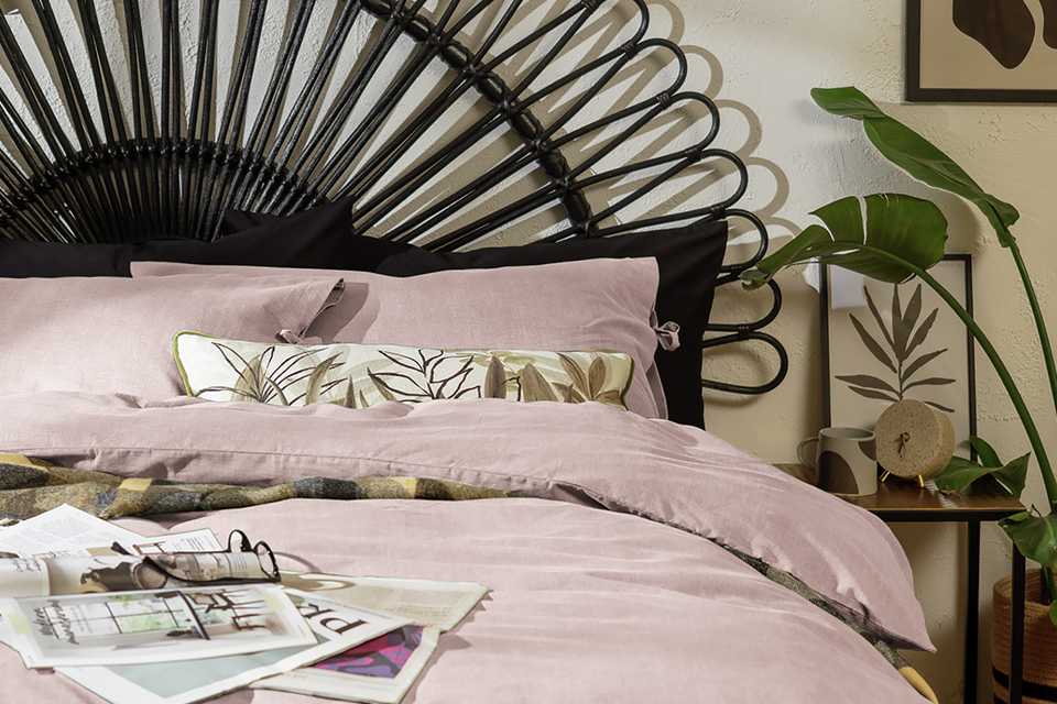 Pink textured bedding set with ties.