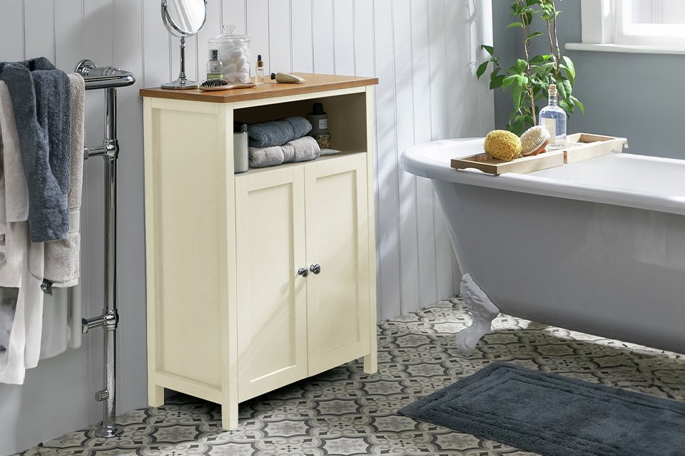 Argos Home Livingston double unit in cream colour placed in a bathroom next to a bathtub. 