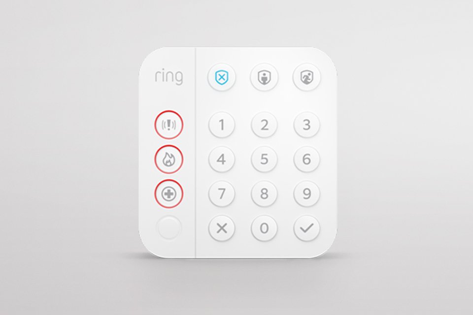 A white Ring keypad of a home security system.