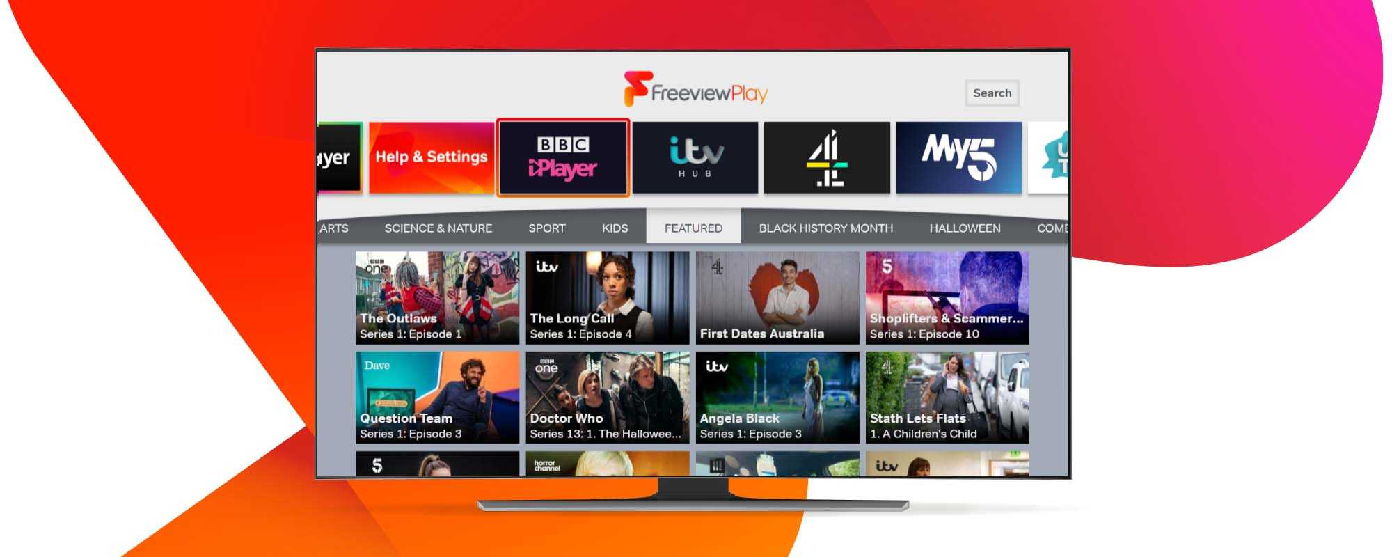 A television screen displaying featured shows and series on Freeview Play, amongst other categories and apps selection.