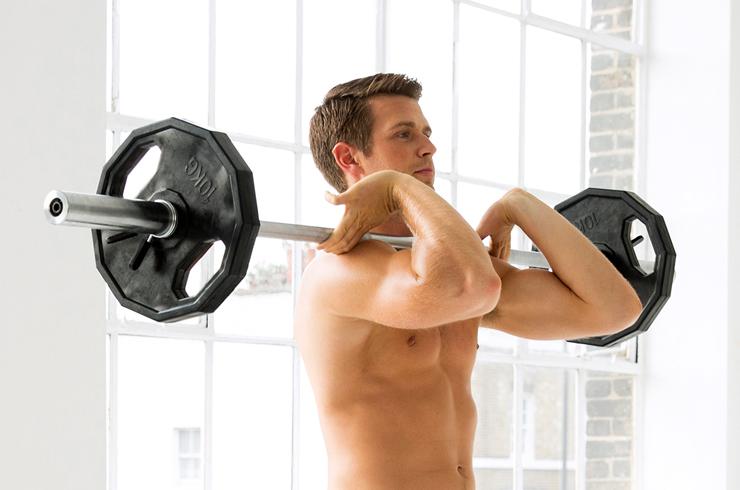 A man working out using a barbell.
